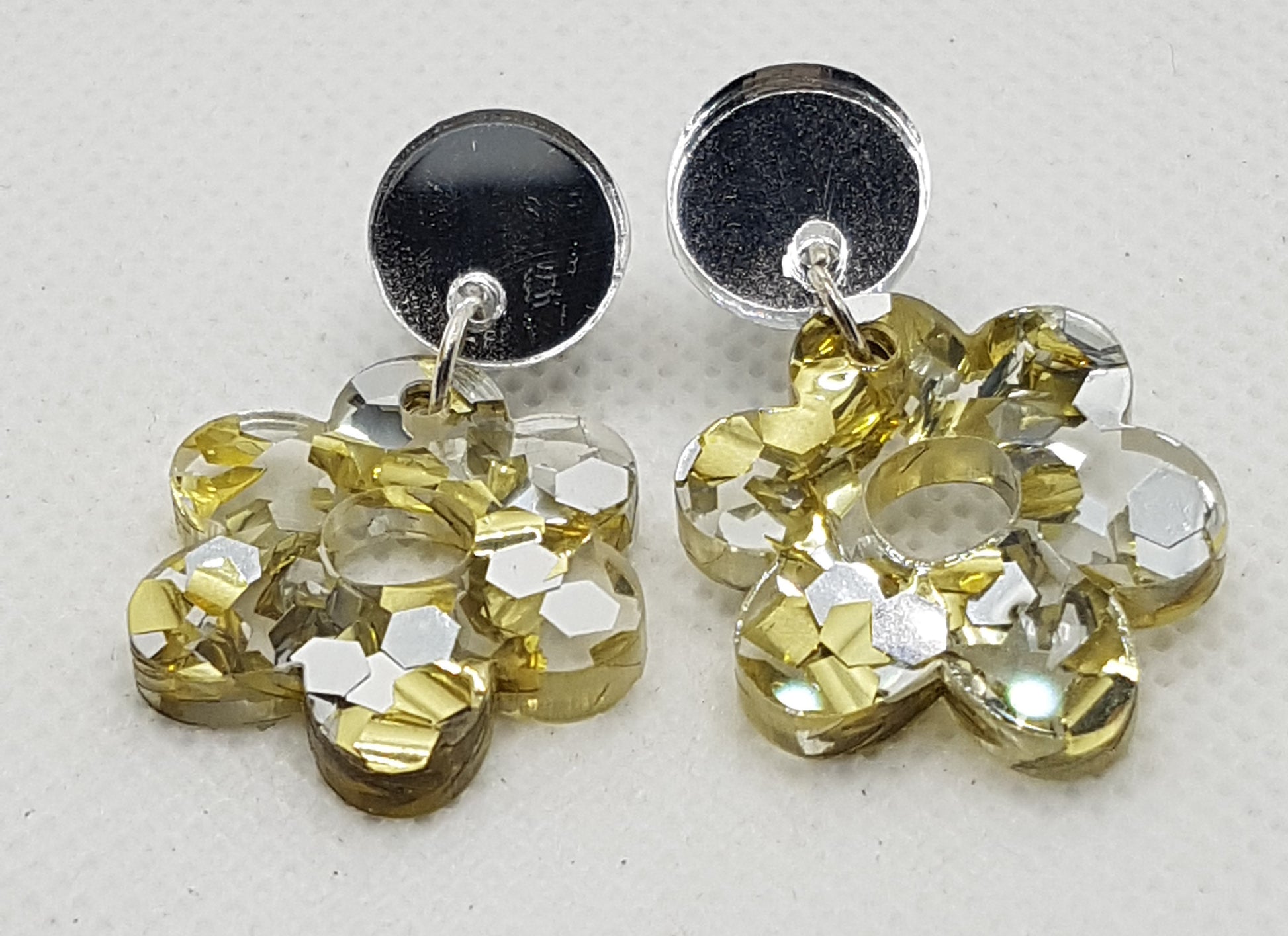 Chunky Glitter Acrylic Laser Cut Flower Earrings in Gold/Silver fleck with Silver Mirrored Round Topper and Surgical Stainless Steel Stud.