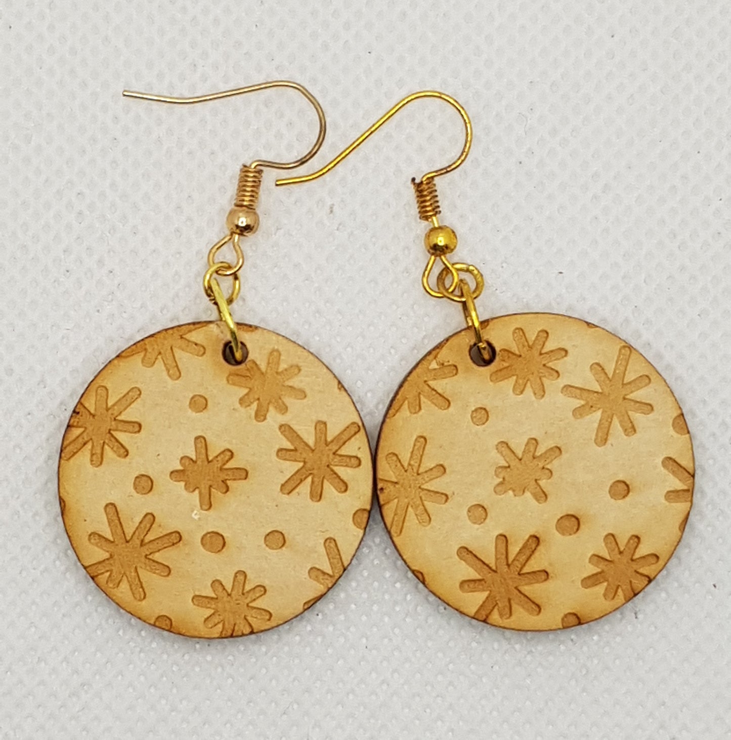 Timber Laser Cut Circular Etched Earrings in a Natural Finish with Gold Plated Shepherds Hooks