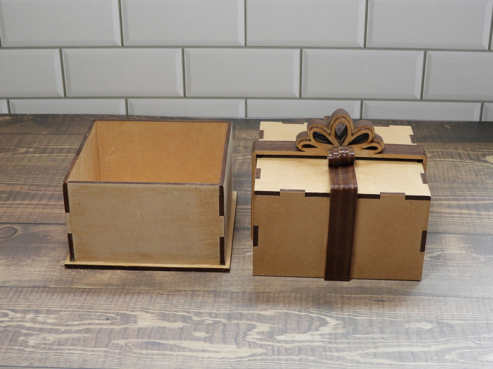 Laser cut timber bow box lid and base side by side